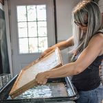 Jenene Nagy working in her studio
