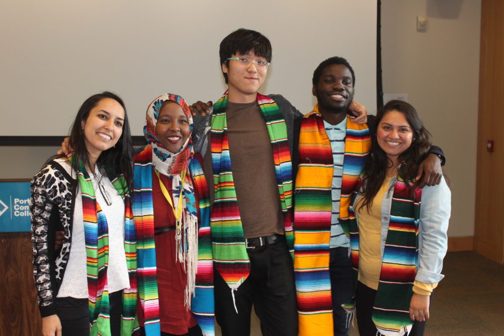 Students wearing matching scarves